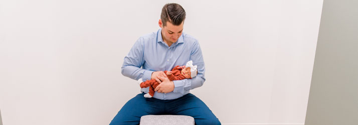 Chiropractor Springfield MO Tyler Alsup Adjusting Infant